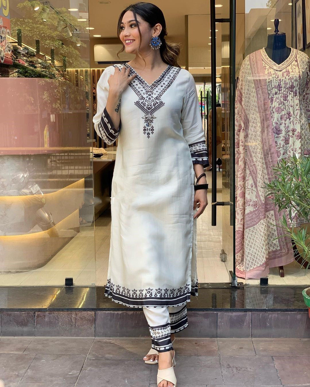 Designer Off White Beautiful Suit With Work On Neck Dropshipera