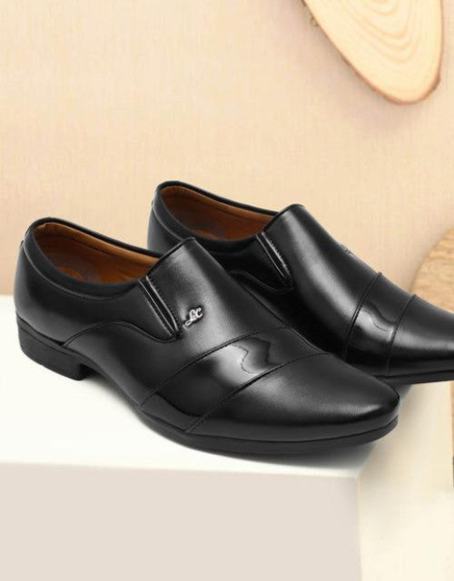 Solid black slip on shoes Dropdash